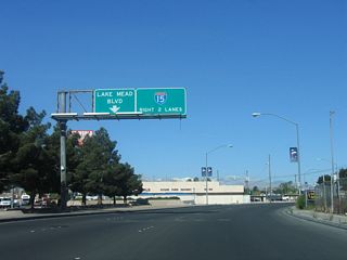 After the intersection with Nevada 604/Las Vegas Boulevard, westbound Nevada 147 (Lake Mead Boulevard) approaches its junction with Interstate 15. Note the lane allocations: The two right lanes provide high-speed access onto Interstate 15, while the left lane continues west on Lake Mead Boulevard.