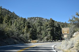 Robber's Roost Trail is a 0.2 mile hiking trail adjacent to Deer Creek Road that leads to caves with rock climbing options.