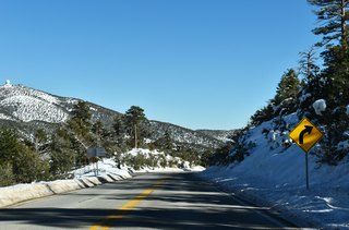 Angel Peak Road winds northeast from SR 158 (Deer Creek Road) to Spring Mountain Junior and Senior High School and a Federal Aviation Administration (FAA) radar station.