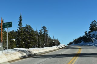 SR 158 (Deer Creek Road) peaks at an elevation of 8,437 feet above sea level.