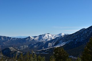 Fletcher Peak rises to the south of Deer Creek Road, topping out at 10,319 feet.