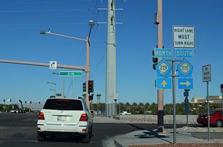 SR 159 along Charleston Boulevard east ends at the diamond interchange (Exit 26) with CC-215 (Bruce Woodbury Beltway).