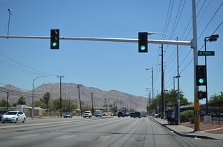 The succeeding traffic light east of I-11/U.S. 93-95 along SR 159 (Charleston Boulevard) is at Sacramento Drive.