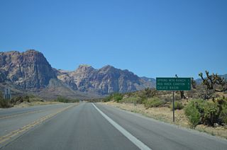 Distance sign posted north of Bonnie Springs Road. SR 159 (Red Rock Canyon Road) north reaches the Las Vegas city limits in 9.2 miles.