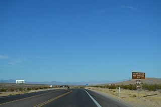 Calico Basin Road spurs west from SR 159 (Red Rock Canyon Road) to the settlement of Calico Basin.