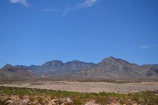 Turtlehead Mountain and the Calico Hills rise to the northwest.
