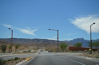 Curving southward, SR 159 (Charleston Boulevard) intersects Sky Vista Drive before leaving Summerlin.