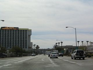 View of southbound Casino Drive, which leads into Downtown Laughlin, with a population of 7,076 in 2000. Laughlin is home of the Harley River Run, Laughlin Desert Challenge, and Fourth of July Celebration. The town was largely founded in 1966, the same year the coal fire plant was constructed by Southern California Edison and Don Laughlin opened the first casino in Laughlin, the Riverside Resort.