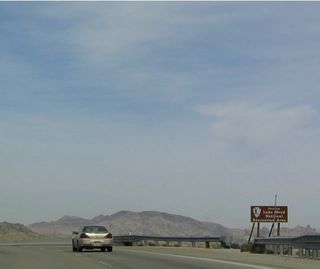 Eastbound Nevada 163 enters Lake Mead National Recreation Area, much of which is undisturbed from Davis Dam north to Hoover Dam.