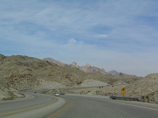 Nevada 163 continues to head downhill with grades in excess of 7% and sharp turns.