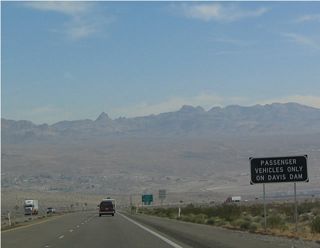 Like Hoover Dam, buses and trucks are prohibited from crossing Davis Dam due to the potential security risk. All trucks and buses should use Nevada 163 east to cross the Colorado River.