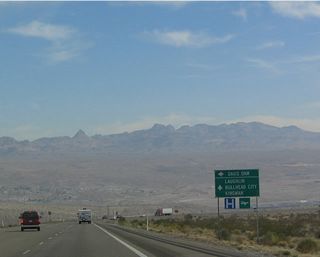 Eastbound Nevada 163 (Laughlin Highway) approaches Davis Dam Road, which leads northeast to the dam and provides an alternate route into Arizona (aside from using the Nevada 163/Arizona 95 bridge).