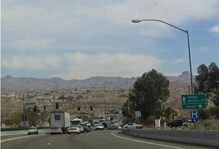 Casino Drive southbound may be used to reach the downtown area of Laughlin, including most casinos and resorts. To reach Kingman and Bullhead City, continue straight ahead on Nevada 163, which changes into Arizona 95 upon crossing the river. The bridge is somewhat hidden, but it is located right after the Casino Drive traffic signal!