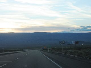 Westbound Nevada 163 (Laughlin Highway) approaches its intersection with U.S. 95, which travels north to Searchlight and Las Vegas or south to Needles and Interstate 40.