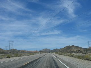 A second 500kV line leads from the Mohave Generation Station to the Lugo substation; Nevada 164 passes under that line prior to entering Searchlight. South of Lugo, several Southern California Edison 500kV power lines lead south through Cajon Pass/Cajon Summit area (visible from Interstate 15) into Fontana and points south. The two single-circuit 230kV power lines also make the connection from the Lugo to Eldorado substations.