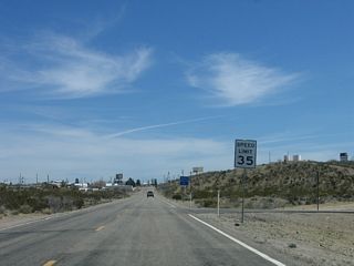 The speed limit along Nevada 164 east reduces to 35 miles per hour at Searchlight.