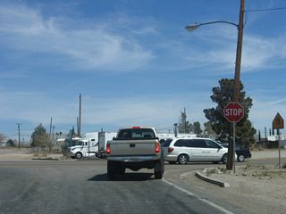 Nevada 164 ends at the intersection with U.S. 95. Cross-traffic on U.S. 95 does not stop.