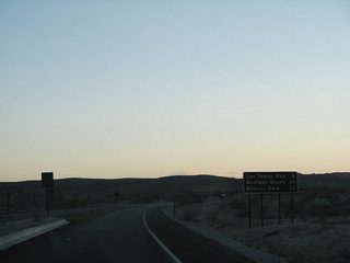 Replaced by 2015, this distance sign after Lake Mead Boulevard listed the distances to Las Vegas Bay (6 miles), Boulder Beach (14 miles) and Hoover Dam (21 miles) via the continuation of Northshore Road south.