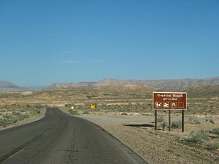 Northshore Road heads east from Valley of Fire Highway (old SR 169) to intersect the access road to Overton Beach. The ensuing stretch was realigned to curve southward during 2009 construction.