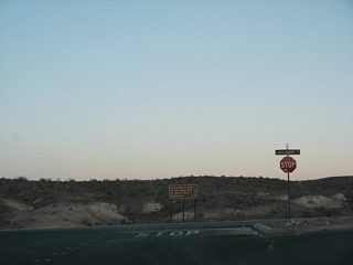 Southbound Northshore Road ends at Lakeshore Drive. Historically, SR 167 ended at this intersection, and a right turn connected to former SR 147 (Lake Mead Drive) west to Henderson. Lake Mead Drive is now Lake Mead Parkway and designated as SR 564 beyond the National Recreation Area boundary. Lakeshore Drive south carried SR 166 around the River Mountains to U.S. 93 near Boulder City and Hoover Dam.