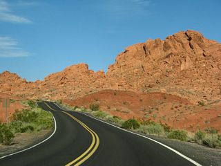 A final set of red rock formations and Elephant Rock line the Valley of Fire Highway east before the state park boundary.
