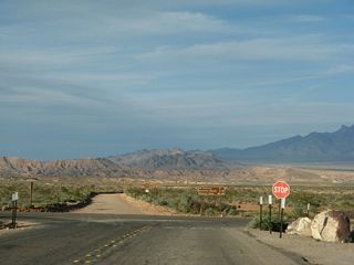 Eastbound Valley of Fire Highway ends at Northshore Drive in Lake Mead National Recreation Area. Northshore Drive north becomes State Route 169 en route to Overton and Logandale.