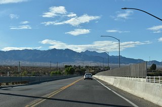 According to the official Description Index for Nevada State Maintained Highways, SR 170 formally begins along Riverside Road ahead of the first of two crossings for the Virgin River.
