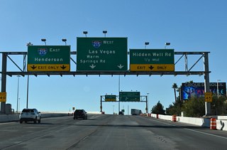 Ramps split for I-215 east to Henderson and I-11/U.S. 93-95 and I-215 west to I-15 and Clark County Route 215 which continues along the Bruce Woodbury Beltway around the greater Las Vegas metro region.