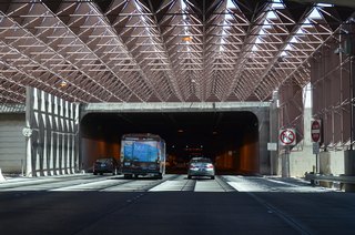 The connector initially enters a three tube tunnel, which measures 2,740 feet in length.