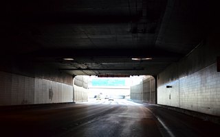 The Airport Connector tunnel opened to vehicular traffic in December 1994. Construction was part of the original I-15/McCarran connector project along I-215.