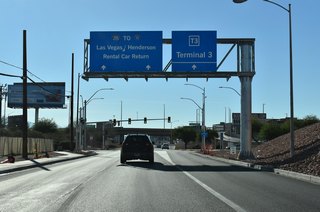 Kitty Hawk Way joins southbound Paradise Road with the cell phone lot for Terminal 1 at LAS Airport.