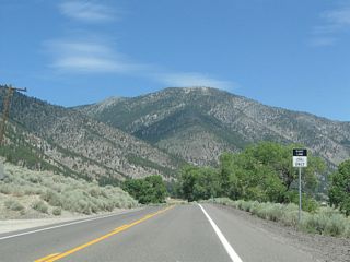 Leaving Walleys Hot Springs, towering Genoa Peak (elevation 9,150 feet above sea level) dominates the view along northbound Nevada 206.