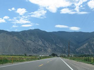 Genoa Lane leads 2.1 miles west toward the Carson Mountains before shifting northward across the Carson River.