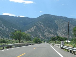 As Nevada 206 proceeds west across the Carson Valley, Genoa Lane crosses the four Carson River channels (East Branch, Central Branch, West Branch, and Overflow Channel), each on bridges built in 1967.