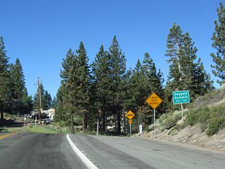 Nevada 207 (Kingsbury Grade) meets Tramway Drive at the top of Daggett Pass (elevation 7,334 feet above sea level).