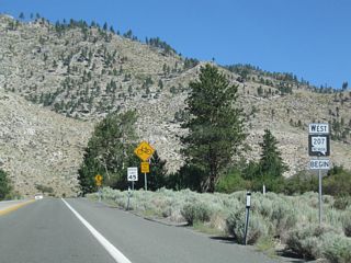 A begin west Nevada 207 shield precedes the northward turn on Kingsbury Grade to Taylor Canyon.