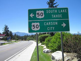 Northeast from SR 207, U.S. 50 follows the shore of Lake Tahoe to Zephyr Cove, Cave Rock, Lake Tahoe Nevada State Park, Spooner Junction, and SR 28 north to Incline Village.
