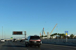 Several car dealerships line the south side of the beltway between Rainbow Boulevard at Exit 15 and Jones Boulevard at Exit 14.