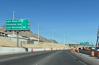 One mile separates Lake Mead Boulevard at Exit 29 with Cheyenne Avenue at Exit 30 along CC-215 north.