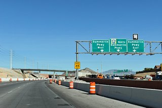 The initial four mile segment of Summerlin Parkway (SR 613) opened between U.S. 95 (Oran K. Gragson Freeway) and Town Center Drive by 1990.1