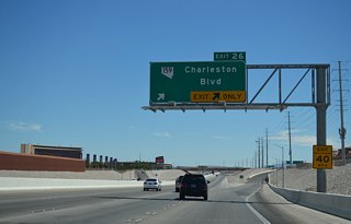 SR 159 follows Charleston Boulevard west to the entrance of Red Rock Canyon before looping south and east to SR 160 near Blue Diamond. Downtown Summerlin lines the east side of CC-215 south of the diamond interchange at Exit 26.
