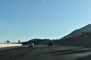 CC-215 shifts to the west of Lone Mountain two miles ahead of Exit 30 to Cheyenne Avenue.