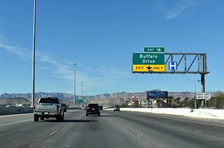Buffalo Drive meets the Bruce Woodbury Beltway one mile west of Rainbow Boulevard at Exit 16.