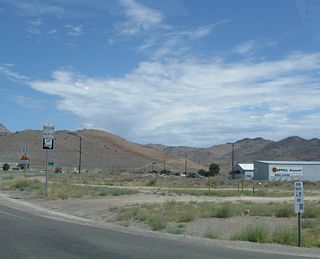Nevada 341 (Comstock Highway) commences north toward Virginia City from the intersection with U.S. 50 midway between Carson City and Dayton. A zero milepost is referenced at the U.S. 50 and Nevada 341 intersection in Lyon County.