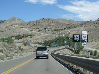 Nevada 342 follows the older road through Silver City and Gold Hill while Nevada 341 shifts east onto the truck route north to Virginia City.