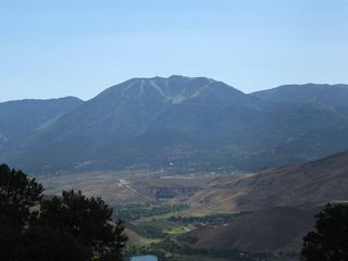 A view to the west looks toward Mount Rose and the Interstate 580 Galena Creek Arch Bridge.