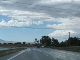 Reaching the bottom of the Geiger Grade in a thunderstorm, northbound Nevada 341 converges with U.S. 395 ALT (Virginia Street) and Nevada 431.