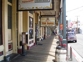 A variety of shops, restaurants, hotels, and casinos are linked by authentic covered wooden walkways along C Street.