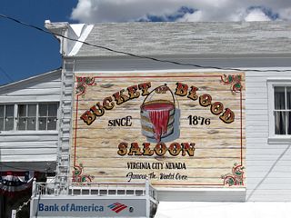 The Bucket of Blood Saloon is advertised around Virginia City and has a unique history that led to its naming. This photo was taken in a parking lot near the intersection of C Street and Union Street.