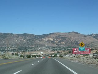 Geiger Grade Road, which carries Nevada 341 from Virginia City to Mount Rose Junction, appears in the distance from SR 431 at Edmonton Drive.